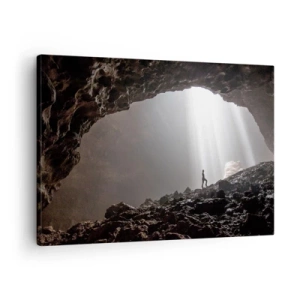 Vászonkép - Egy alak egy barlangban, fénysugarakkal megvilágítva - 70x50cm - A fényes barlang - Modern fali dekoráció nappalihoz és hálószobához ARTTOR
