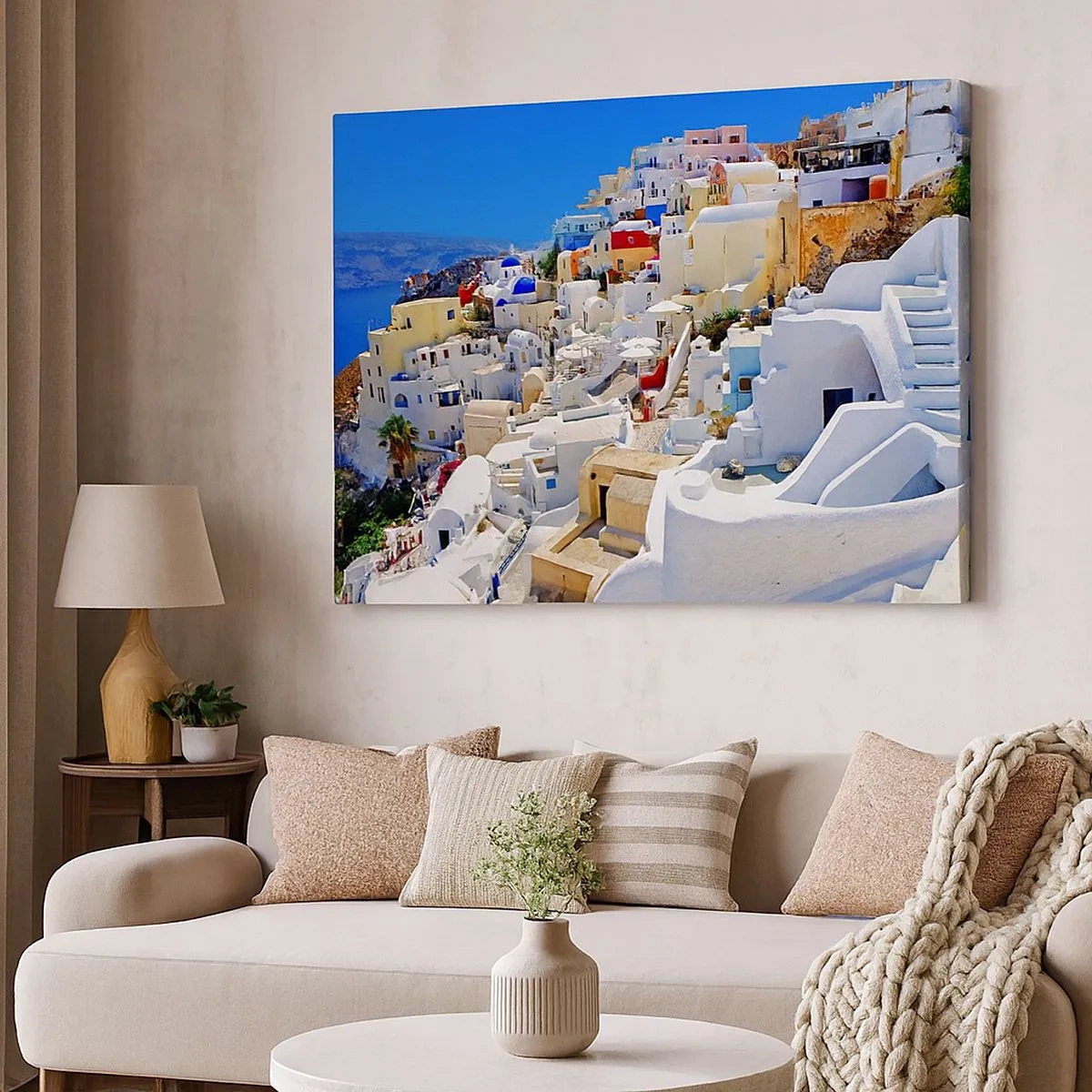 Vászonkép - Santorini panorámája fehér házakkal és kék éggel - 70x50cm - Álom a görög nyárról - Modern fali dekoráció nappalihoz és hálószobához ARTTOR