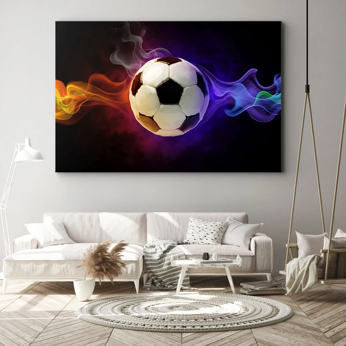 Vászonkép - Egy futball-labda, sötét háttér előtt színes füsteffektusokkal körülvéve. - 70x50cm - A játék varázsereje - Modern fali dekoráció nappalihoz és hálószobához ARTTOR