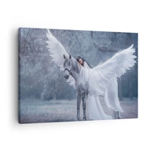 Vászonkép - Egy nő fehér lovon, szárnyakkal egy varázslatos erdőben - 70x50cm - Egy ihletett pillanat - Modern fali dekoráció nappalihoz és hálószobához ARTTOR