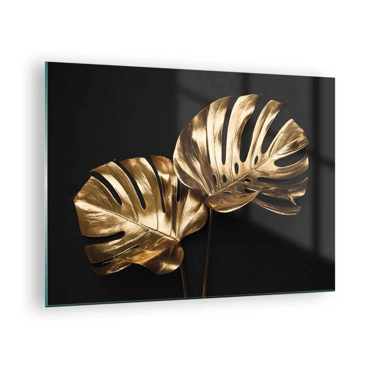 Üveg kép - Arany monstera levelek fekete háttéren - 70x50cm - A természet kincsei - Modern fali dekoráció nappalihoz és hálószobához ARTTOR