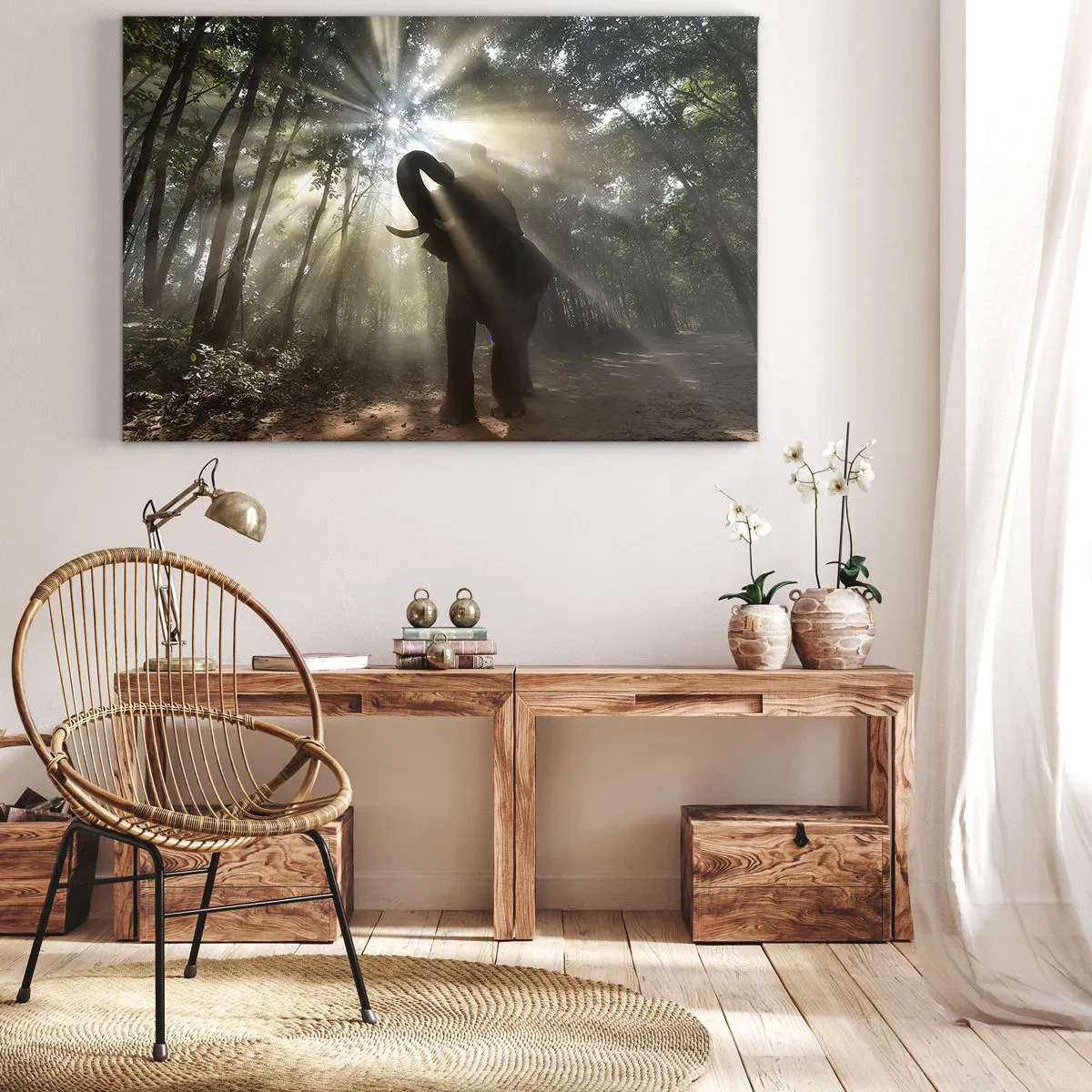 Vászonkép - Egy elefánt az erdőben, fénysugarakkal körülvéve a reggeli ködben. - 70x50cm - A szerencsecsillag alatt - Modern fali dekoráció nappalihoz és hálószobához ARTTOR
