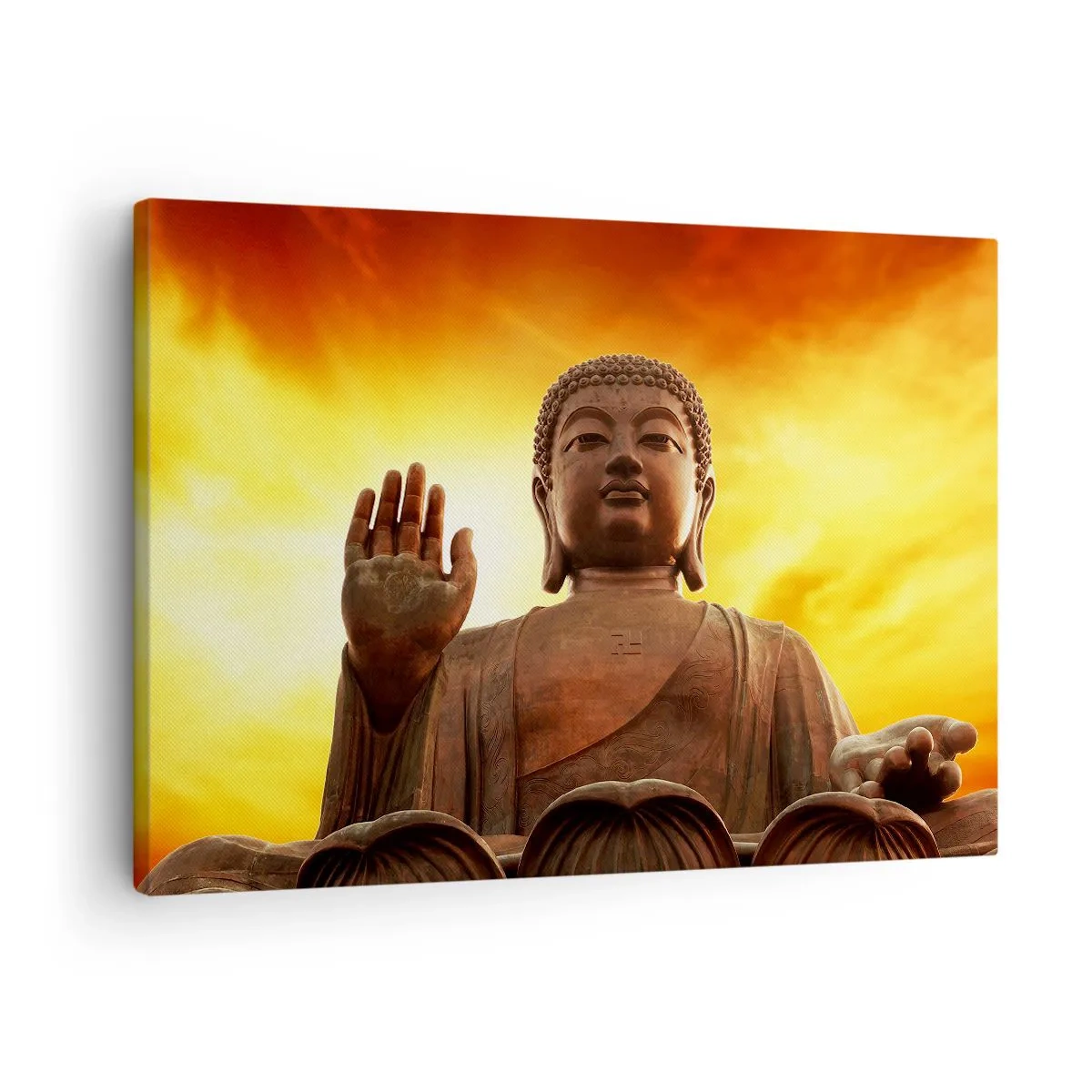 Vászonkép - Egy Buddha-szobor az aranyló naplemente előtt - 70x50cm - A világ békéje - Modern fali dekoráció nappalihoz és hálószobához ARTTOR