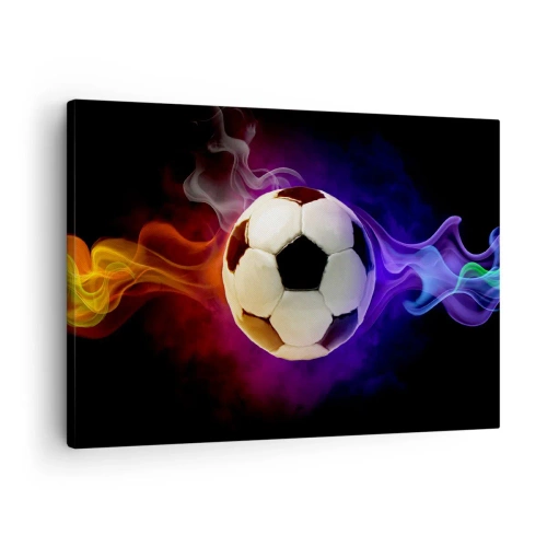 Vászonkép - Egy futball-labda, sötét háttér előtt színes füsteffektusokkal körülvéve. - 70x50cm - A játék varázsereje - Modern fali dekoráció nappalihoz és hálószobához ARTTOR