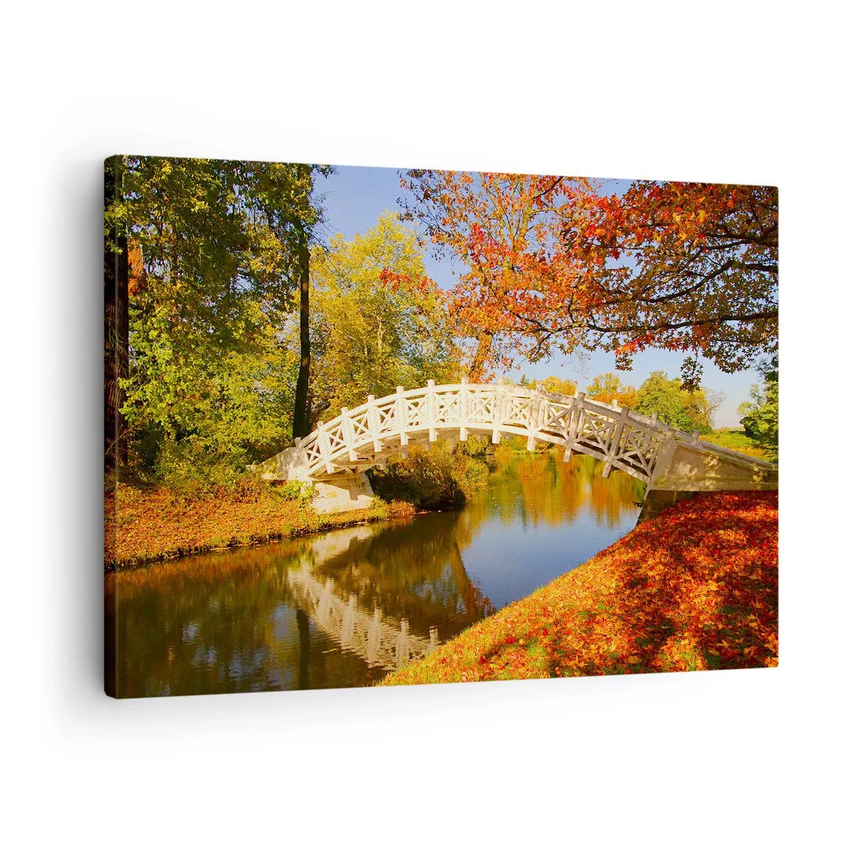 Vászonkép - Egy híd egy parkban, őszi levelekkel körülvéve, nyugodt víz felett - 70x50cm - A sóhajok fehér hídján - Modern fali dekoráció nappalihoz és hálószobához ARTTOR