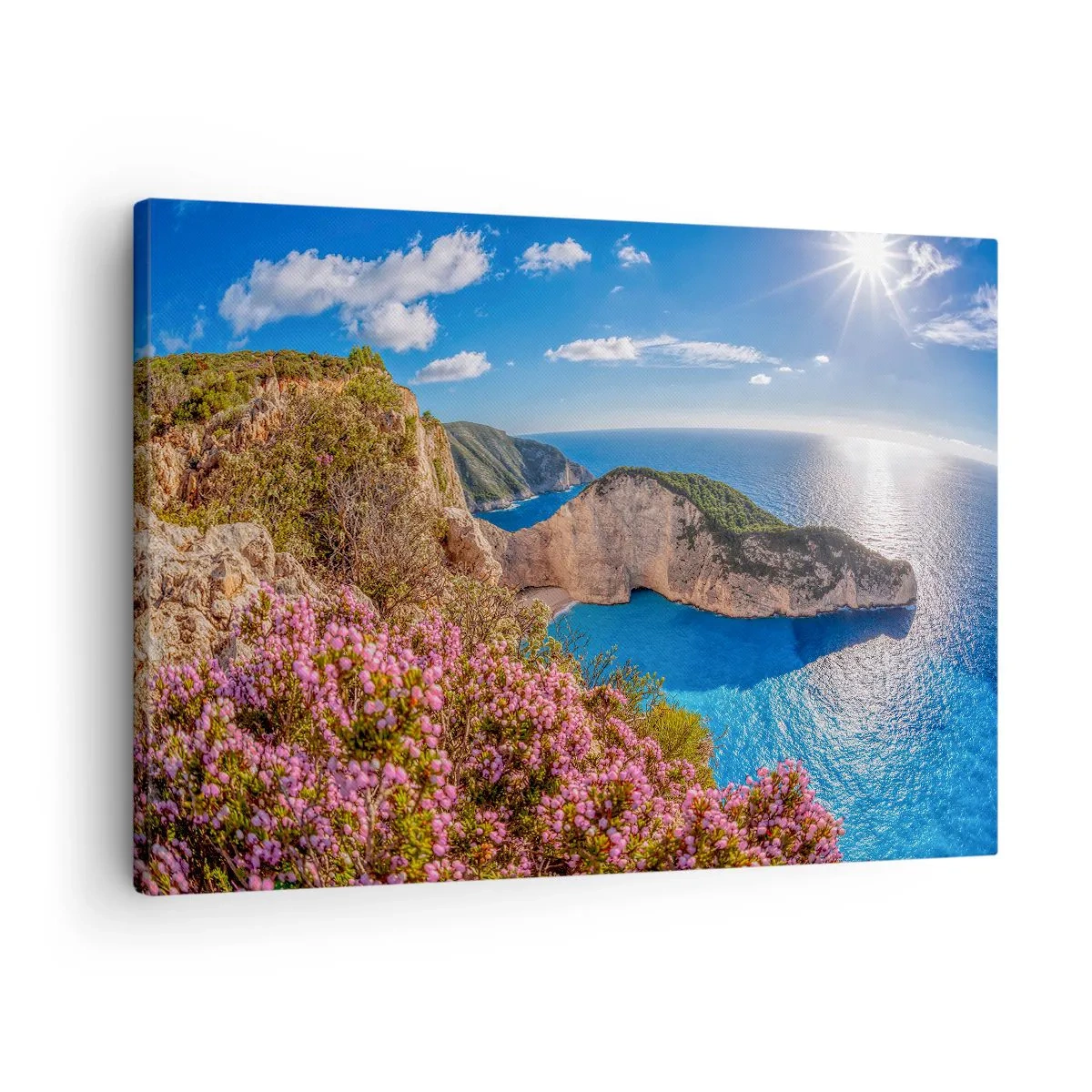 Vászonkép - Egy virágos szikla, türkizkék tenger és napsütötte görög táj - 70x50cm - Nagyszerű görög nyaralásom - Modern fali dekoráció nappalihoz és hálószobához ARTTOR