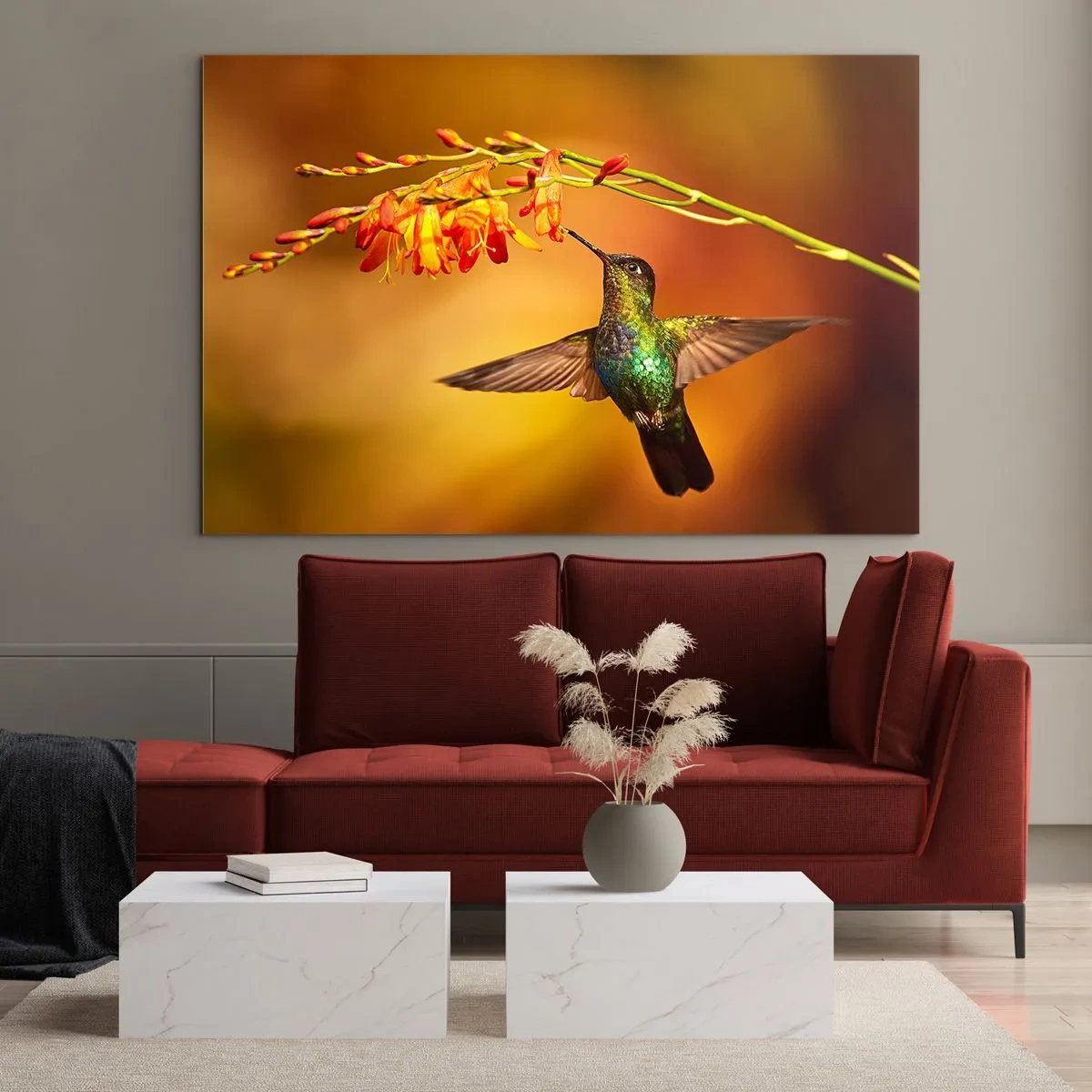 Üveg kép - Kolibri virágok mellett, aranyló fényben - 70x50cm - A fény hírnöke a maják szerint - Modern fali dekoráció nappalihoz és hálószobához ARTTOR