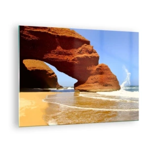 Üveg kép - Vörös sziklaívek a strand és az óceán felett - 70x50cm - Víz és szél évezredek óta - Modern fali dekoráció nappalihoz és hálószobához ARTTOR