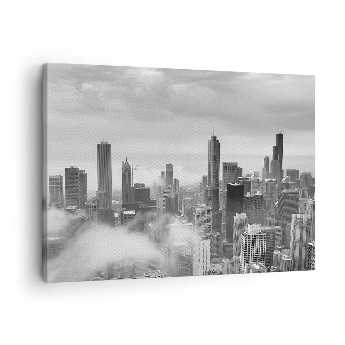 Vászonkép - Városi panoráma felhőkarcolókkal a felhőkben, fekete-fehérben - 70x50cm - Amerikai táj - Modern fali dekoráció nappalihoz és hálószobához ARTTOR